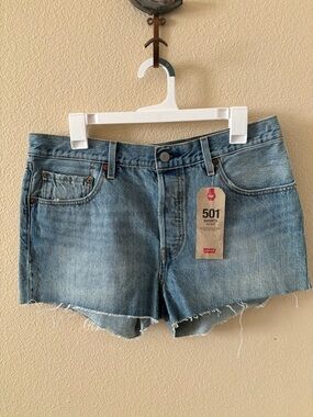 Levi's 501 mid rise Women's Denim Cutoff Shorts in Light Blue Wash